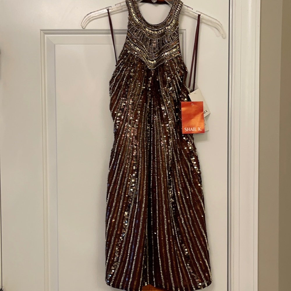 A beautiful cocktail dress brand new for you to enjoy!!